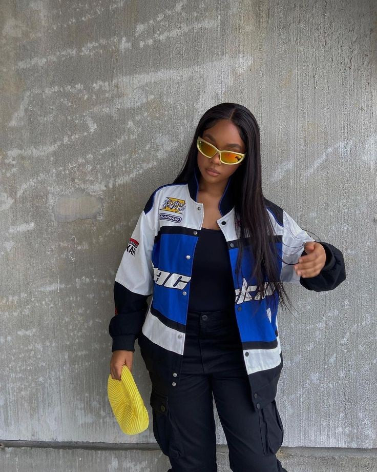 Front view of a vintage Blackair racer jacket in black with an oversized fit and retro branding.