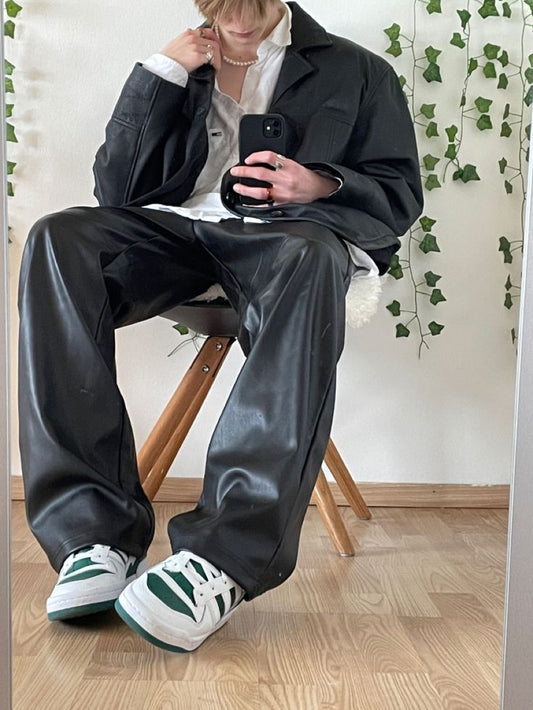 Classic loose-fitting black faux leather pants