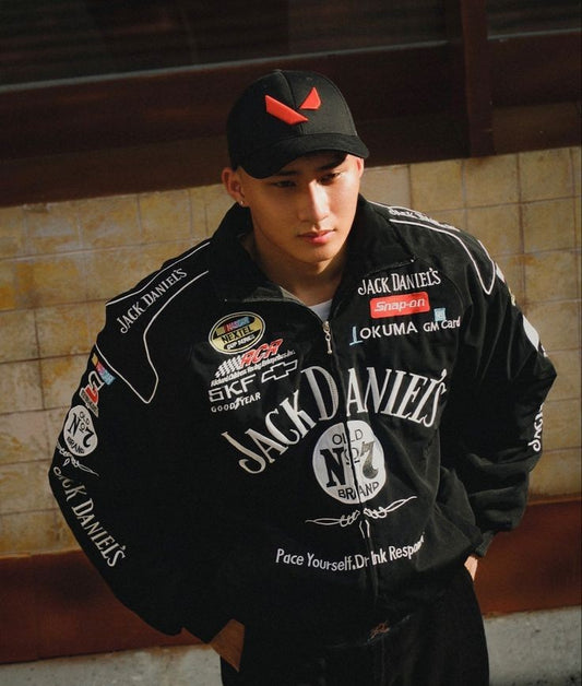 Vintage Jack Daniel's retro racer jacket featuring bold logo patches and classic motorsport-inspired design. 

