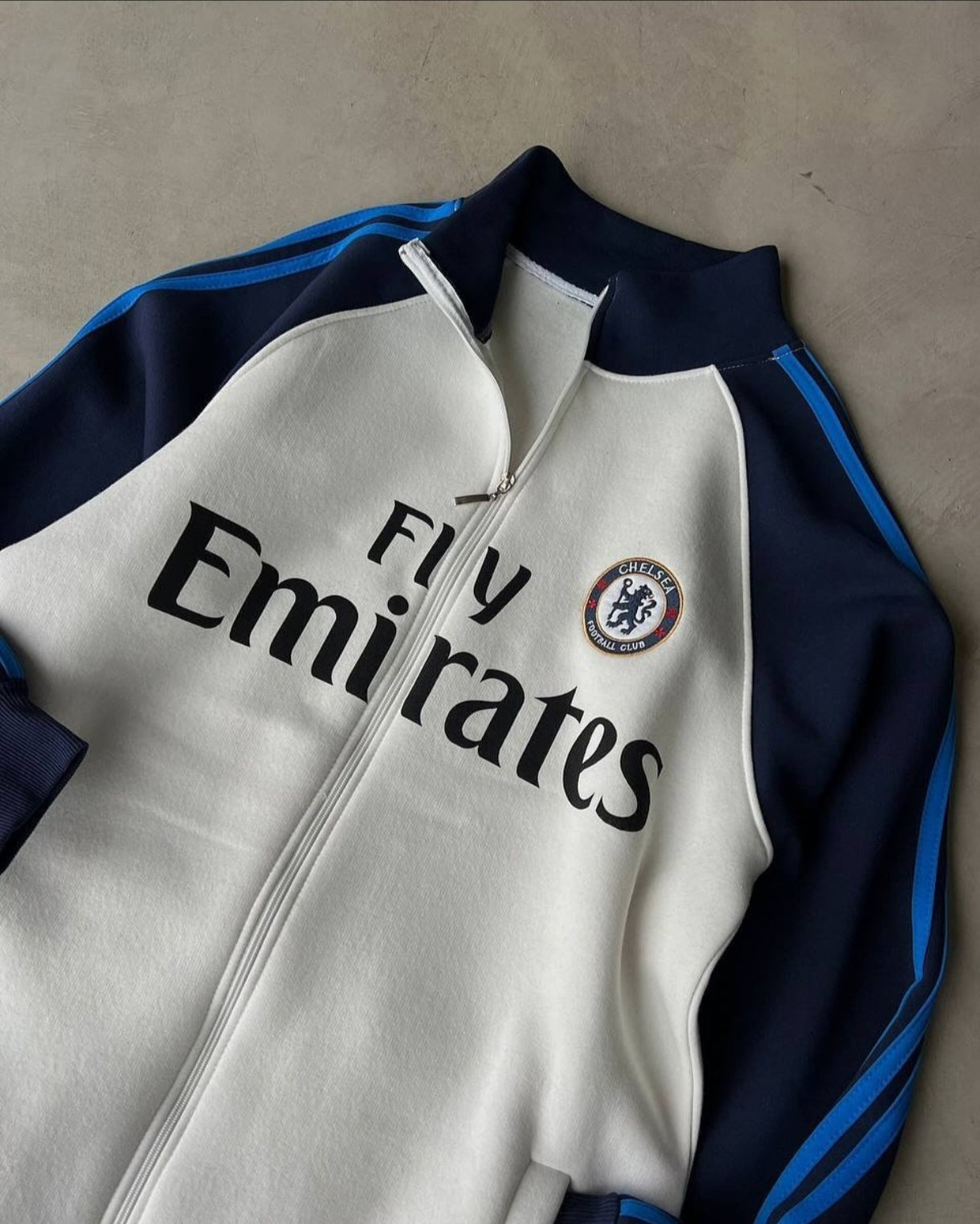 Men’s white and blue Chelsea sports jacket with zip-up front