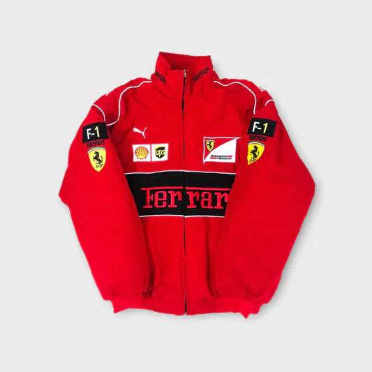 Red Ferrari jacket with various logos on a light gray background
