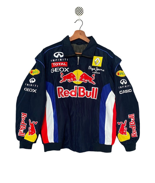  Red Bull Racing vintage F1 jacket featuring a bold design with prominent logos and a zip-up front, showcasing a sporty and stylish silhouette for motorsport enthusiasts. 